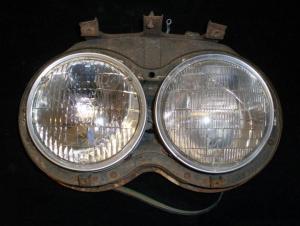 1958 Cadillac headlight pot left