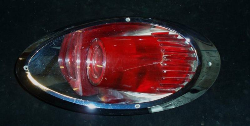 1961 Dodge sw tail light left (good chrome, broken glass)