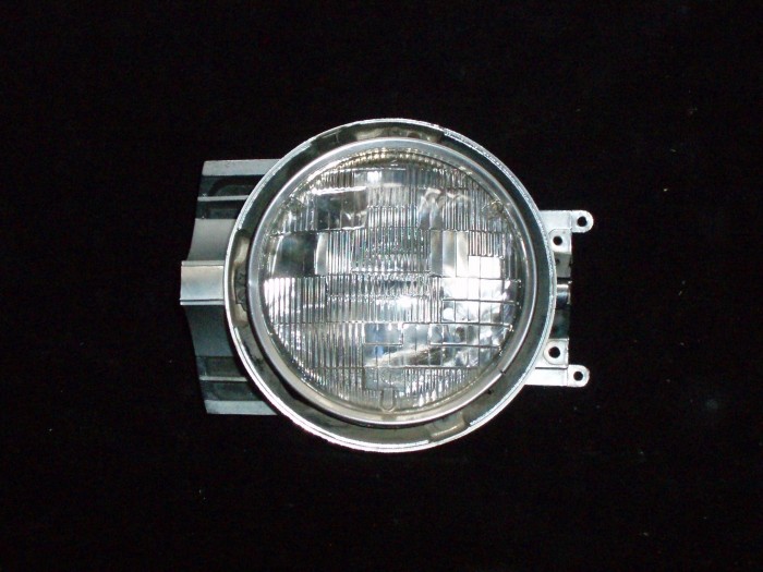 1964 Oldsmobile 98 headlight pot outer right