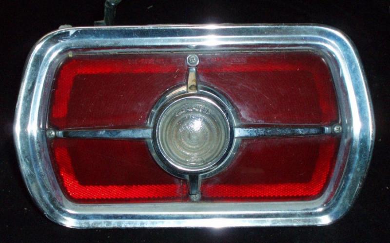 1965 Ford Fairlane 500 tail light left (crack in glass)