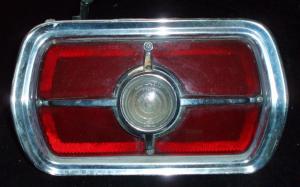1965 Ford Fairlane 500 tail light left (crack in glass)