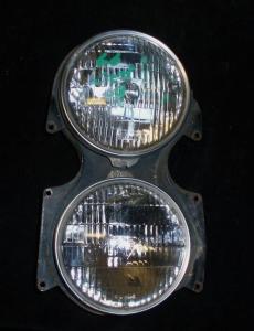 1966 Cadillac headlight pot right