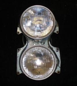 1966 Cadillac headlight pot left