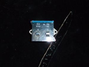 1975 Cadillac rear window power antenna control