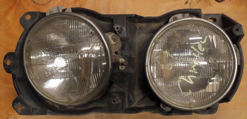 1969  Chrysler     left headlight pot