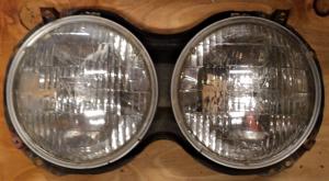 1963   Cadillac           headlight pot   right