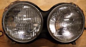 1963   Cadillac           headlight pot   left