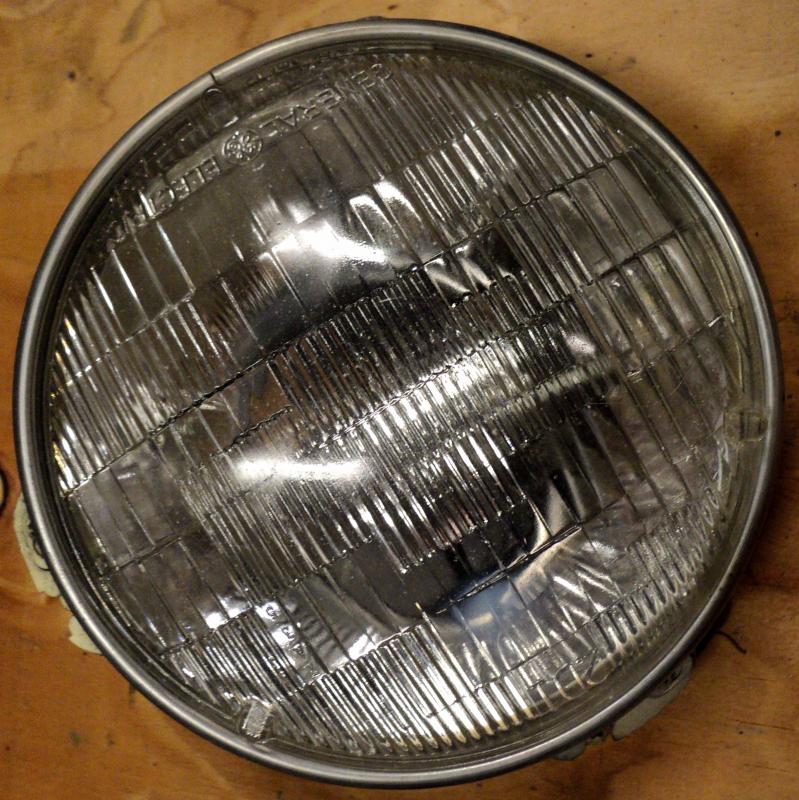 1965  Dodge Dart          headlight pot   left
