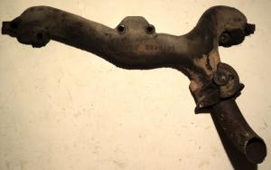 1963   Cadillac    exhaust manifold left 1475463 (stuck gate)
