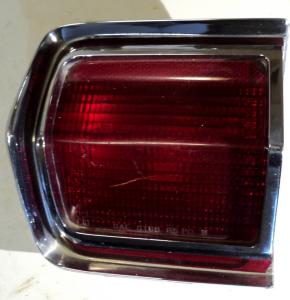 1965  Plymouth Fury   taillight  left outer (small crack in the glass, see picture)