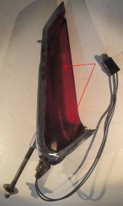1961   Cadillac    taillight  (crack in glass)  left