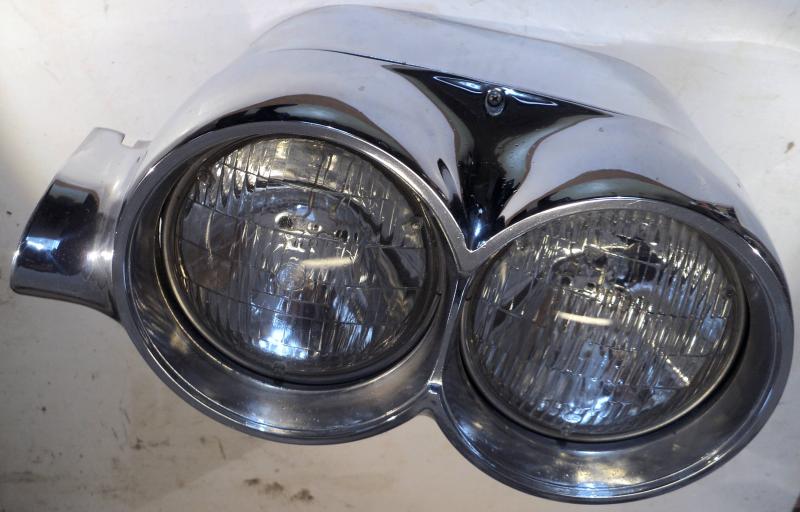 1959  Chrysler Imperial   headlight pot + headlight door left (A little pores in the chrome)