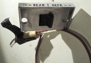 1964 Oldsmobile 98  rear defroster button