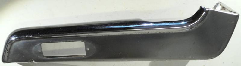 1960 Lincoln Continental      seat side plate (pores in chrome)
