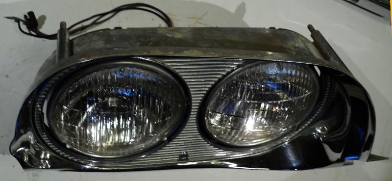 1959 Thunderbird  lamp body  (pores in Chrome on top under the hood) left