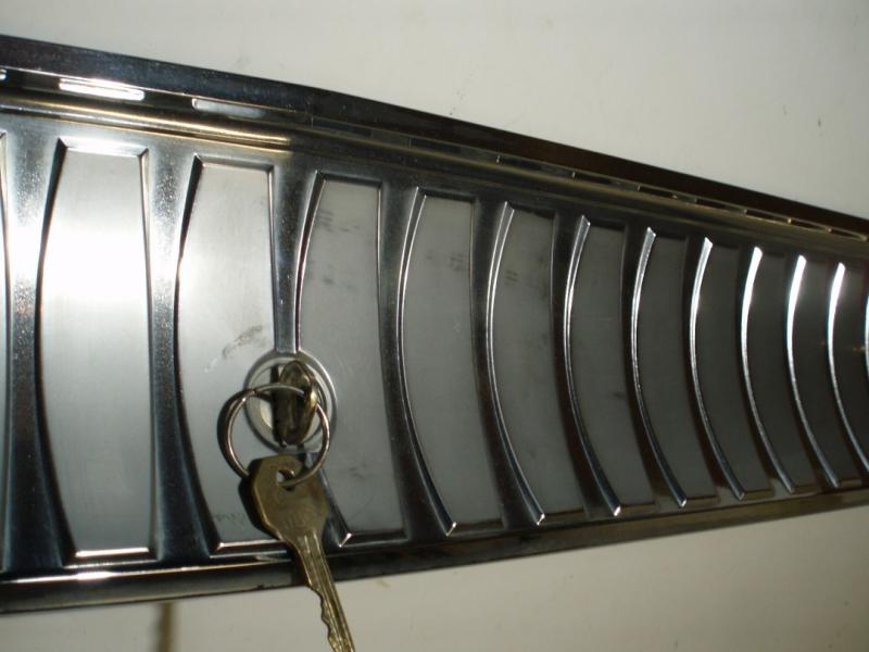 1964 Oldsmobile 98 chrome strip below the trunk lid 