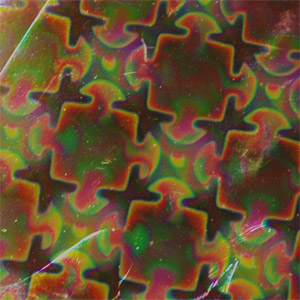 Dichroiskt fusingglas 10x10 cm Puzzel på svart glas.