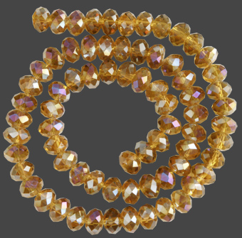 Glaspärlor facetterad rondell 6,5x4,5 mm. Amber, ca 65 st