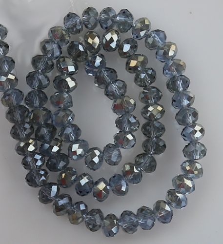 Glaspärlor facetterad rondell 6,5x4,5 mm. Grå med lite blå ton. ca 65st
