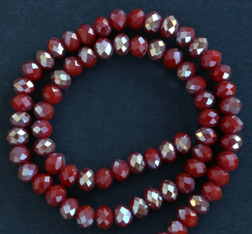 Glaspärlor facetterad rondell 6,5x4,5 mm Röd / Silver, ca 65 st