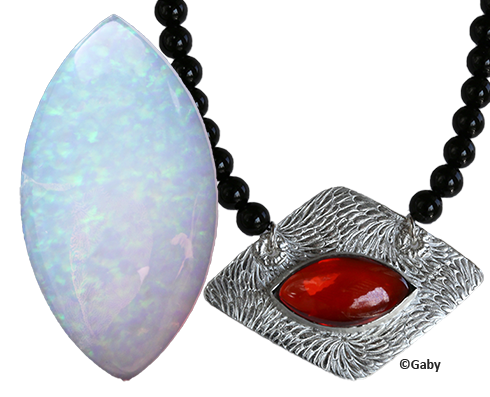 Syntetisk Opal 24x13 mm Vit. Skiftar lite i blått eller rosa. Den här stenen tål inte att brännas.