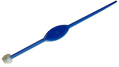 Sticka med vax för att plocka upp stenar och pärlor