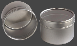 Metallburk med transparent lock. Storlek 64x45 mm.