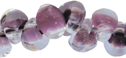 Glasdroppar i en "strand" om ca 25 st. Ljus ametist-rosa