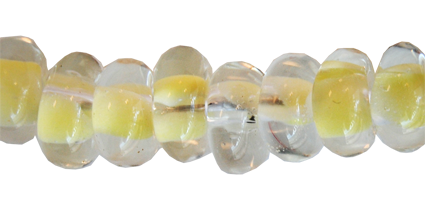 Glasringar sträng om ca 25 st. Gul-klar