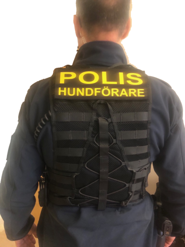 Ryggmärke Polis Hundförare