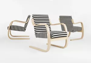 Omklädsel av Alvar Aalto karmfåtölj P402 i tyg eller skinn