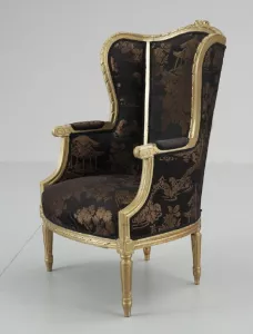 Omklädsel av öronlappsfåtölj med fast sits