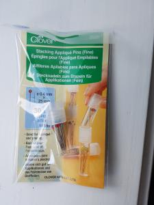 Knappnål till applikation