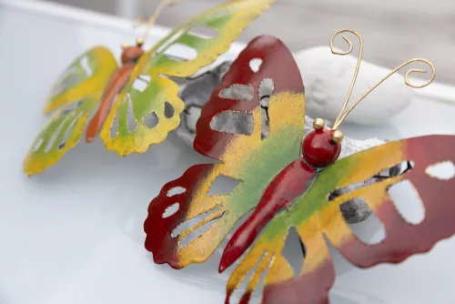 Fjäril I Hamrad Plåt