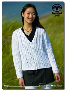 Damkofta med hålmönster och V-ringing