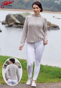 DAMTRÖJA MED HÅLMÖNSTER OCH FLÄTA