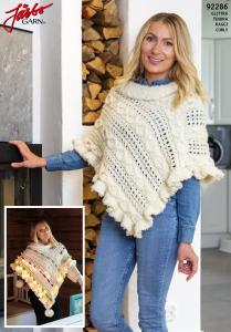 JULIG FLÄT- OCH HÅLSTICKAD PONCHO