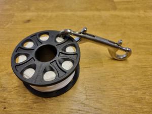 Spole med 30 m lina och rostfri double ender