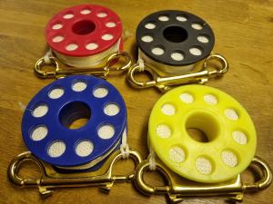 Spole med 20 m lina och double ender i mässing