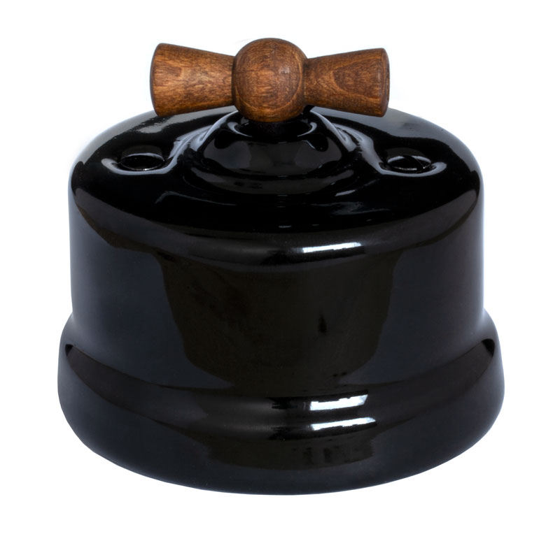 Gammaldags strömbrytare i svart porslin med trävred - gammaldags inredning - klassisk stil - retro - sekelskifte