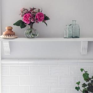 Bathroom shelf made of old-fashioned wooden consoles - old style - vintage style - classic interior - retro