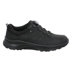 Profilvy av insidan på en svart Jomos Jomotion herrsneaker i skinn med snabbsnörning mot en vit bakgrund.