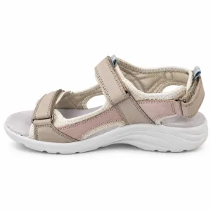 Park West beige komfortsandal i sidoprofil med justerbara kardborremmar, ljusrosa sidopanel, vadderad hälrem och ljus stötdämpande sula mot vit bakgrund.