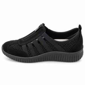 Soft Comfort svart komfortsko i sidoprofil med dragkedja, elastiska remmar, ventilerande mesh och svart räfflad sula mot vit bakgrund.