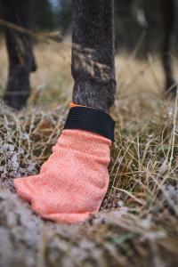 Slitstarka tasskydd gjorda av anti-cut material, designade för att underlätta naturlig expansion och rörelse av din hunds tassar.