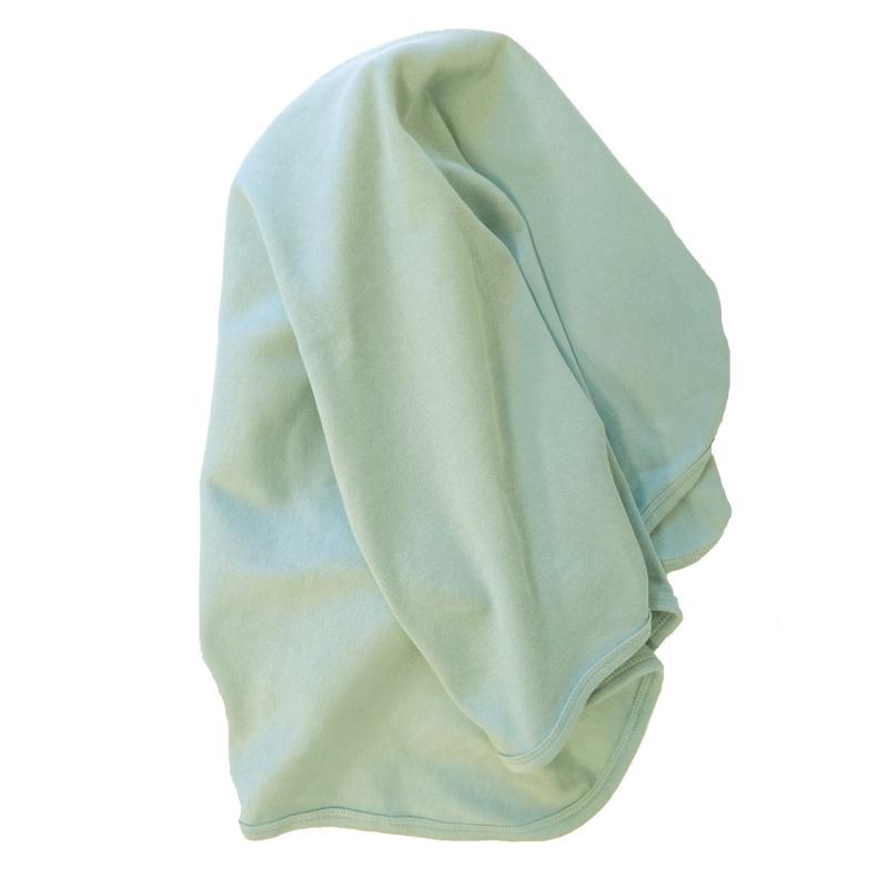 Baby blanket in soft mint color. Organic and GOTS-certified cotton.