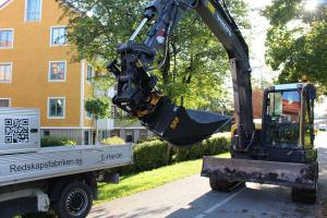 Grävskopa planeringsskopa grävmaskin