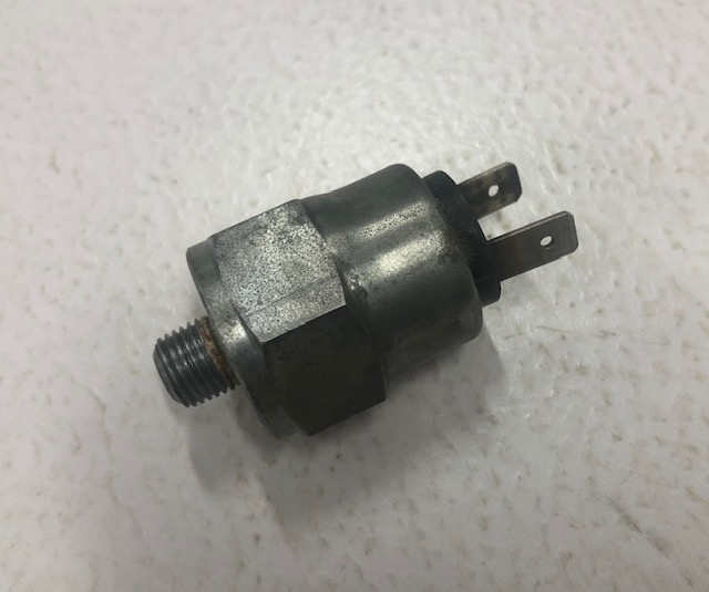 Pressure switch (Used) activates front-wheel drive