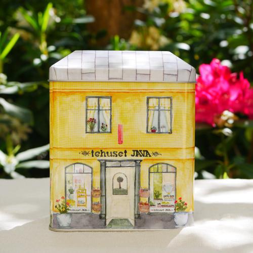 Gul burk som ser ut som ett hus