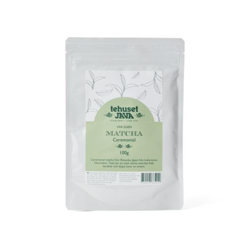 Vit förpackning med 100g matcha te